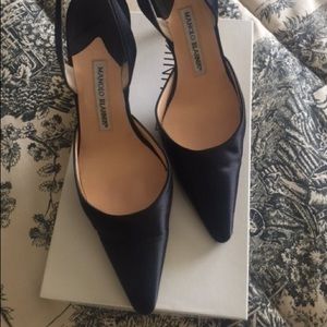 Manolo black heels.